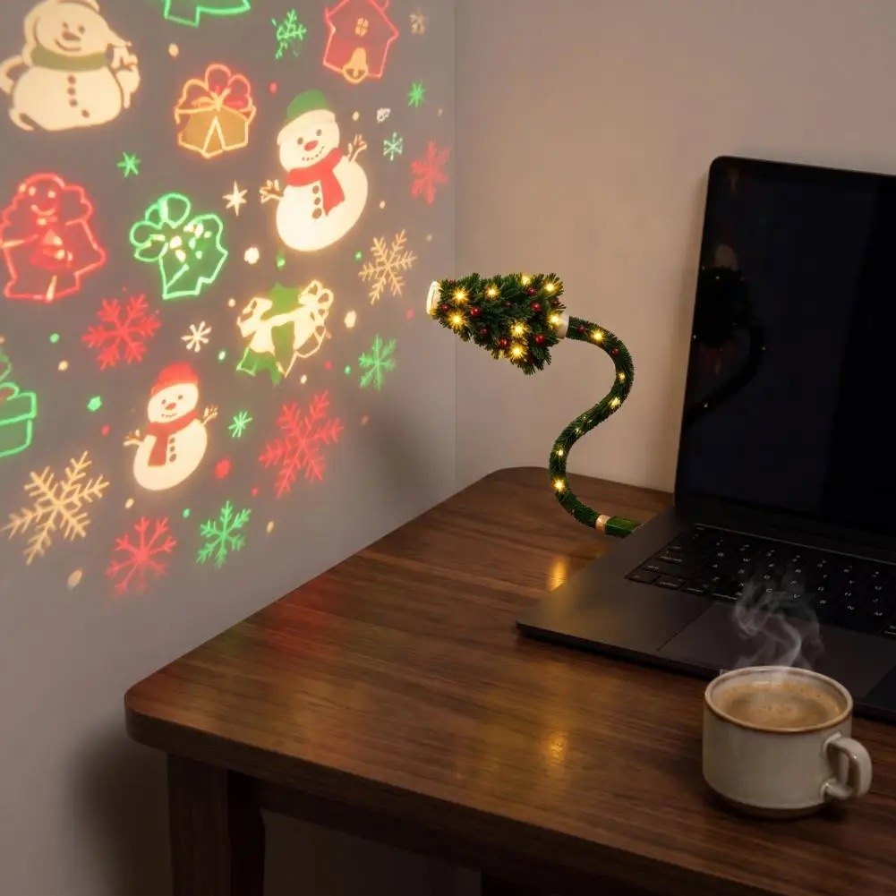 Wonder Tree on a desk projecting snowmen on the wall